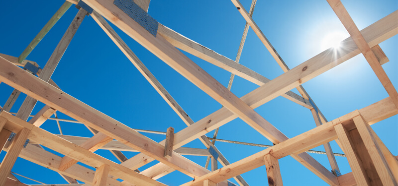 Wood Scaffolding for Building a House with Blue Sky Photo